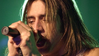 Tantric lead singer denies he's unlicensed used-car dealer
