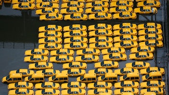 How are automobile dealers dealing with the aftermath of superstorm Sandy?