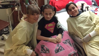 Taylor Swift visits recovering fan in Phoenix hospital
