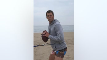 Tom Brady’s booty shorts with faces spark debate