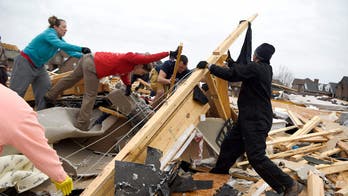 Tornadoes, flooding across central US leave at least 5 dead as storm system moves east