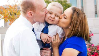 Community celebrates holidays early for terminally ill boy