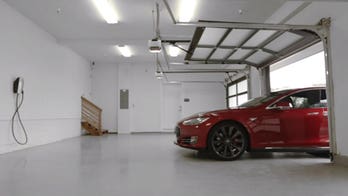 Tesla software update allows self-parking, limits speed