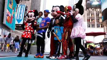 Mickey Mouse busted for conning Times Square tourist