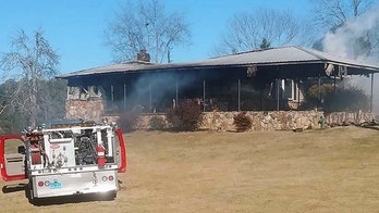 Roy Moore accuser's home burns down; arson suspected