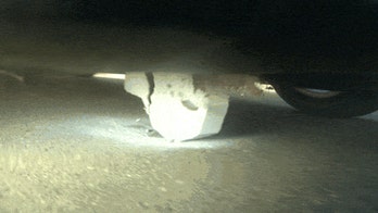 Feds close investigation of Tesla battery fires, new shields added