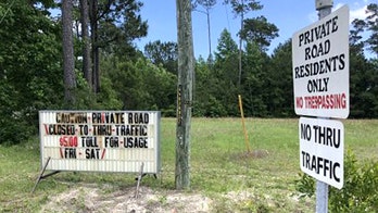 Fed up North Carolina residents install toll on private road to curb beach cut-through traffic