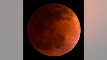 Under a 'Blood Moon': First total lunar eclipse of the year wows stargazers
