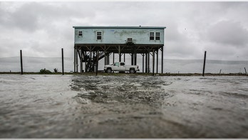 Tropical Storm Cindy's remnants unleash heavy rains on Gulf Coast; reports of a tornado in Alabama