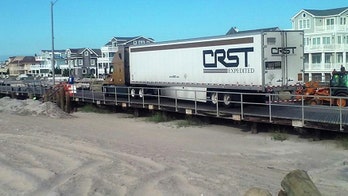 Tractor trailer makes wrong turn and gets stuck on New Jersey beach boardwalk