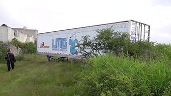 Residents complain about smell after 157 unidentified bodies discovered in morgue trailer in Mexico