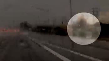 Train derails after hitting floodwaters on tracks in Arizona