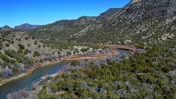 Search for Southwest treasure to go on, agree hunter's widow, mysterious millionaire