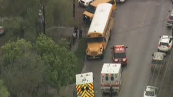 Students hospitalized after Houston school bus slams into car