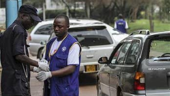 Uganda's Ebola toll climbs to 16, officials say fears lessen