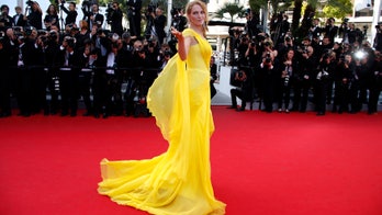 Uma Thurman wows the crowds at Cannes in Versace