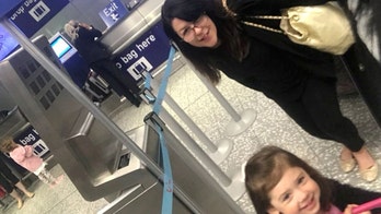 Mom barred from boarding plane with 3-year-old daughter because of torn passport page
