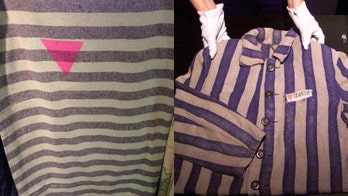 Urban Outfitters under fire for tapestry 'eerily' similar to concentration camp uniform