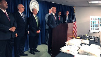 Boston city worker, convicted cop killer among 29 charged in federal drug sweep