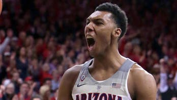 Trier scores season-high 25, No. 4 Wildcats pound USC