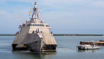 Warren Buffett on hand as Navy commissions newest warship