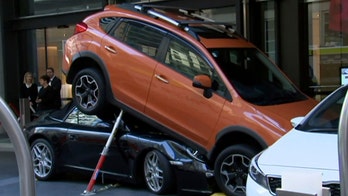 Hotel valet parks Porsche underneath car
