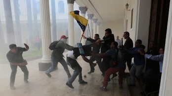 Starving Venezuelans mob field and slaughter cattle, report says