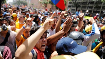 Venezuela security forces clash with anti-Maduro protesters across the country