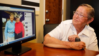 Vet sues after burial with gay partner is denied by cemetery