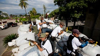 Angry residents continue holding dozens of alleged gang members in Mexico