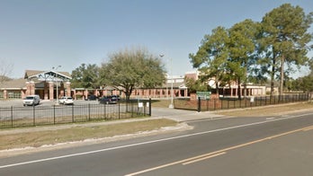Student shot in stomach at Alabama high school; police search for suspect