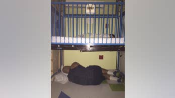 Photo of dad sleeping under son's hospital crib goes viral