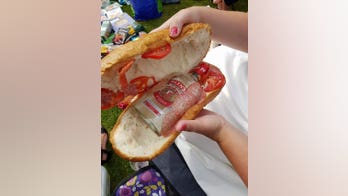 Woman caught smuggling vodka into sporting event inside salami sandwich