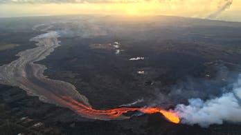 Hawaii volcano tourists may soon see eruption from safe viewing area on land, official says