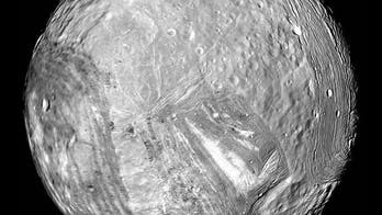 Bizarre shape of Uranus' 'Frankenstein' moon explained