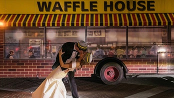 Couple takes Waffle House-themed wedding portraits after posing for Waffle House engagement pics