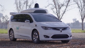Waymo launching self-driving car service next month, report says
