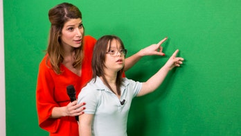 French weather presenter with Down syndrome scores a hit