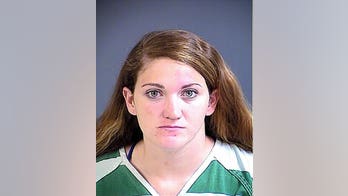 High school teacher charged with DUI after allegedly crashing into police car