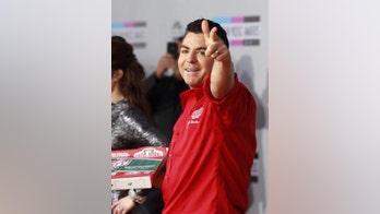 Papa John’s founder insures hands for $15 million