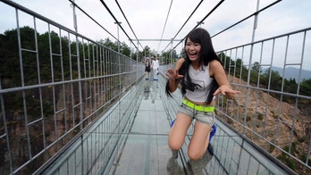 China opens terrifying glass-bottom walkway dubbed ‘Brave Men’s Bridge’