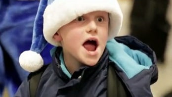 WestJet Airlines shocks passengers by giving Christmas gifts during flight