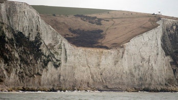 Twins who plummeted off White Cliffs of Dover were carrying parents' ashes