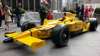 Hundreds of Indy 500 drivers sign car for charity auction