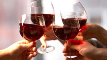 What is the right way to hold a wine glass?