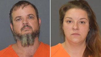Father, girlfriend hog-tied son, 15, forced him to wear shock collar: cops