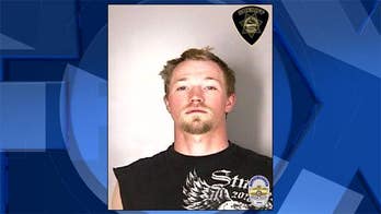 Oregon suspect tried to put co-worker in wood chipper, police say