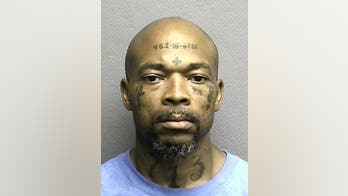 'Social Security' bandit has number tattooed on forehead -- but cops haven't caught up