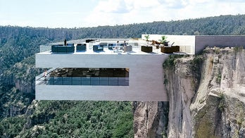 This design features a restaurant built in a canyon cliff face