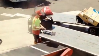 Airline employee caught throwing musicians' fragile baggage